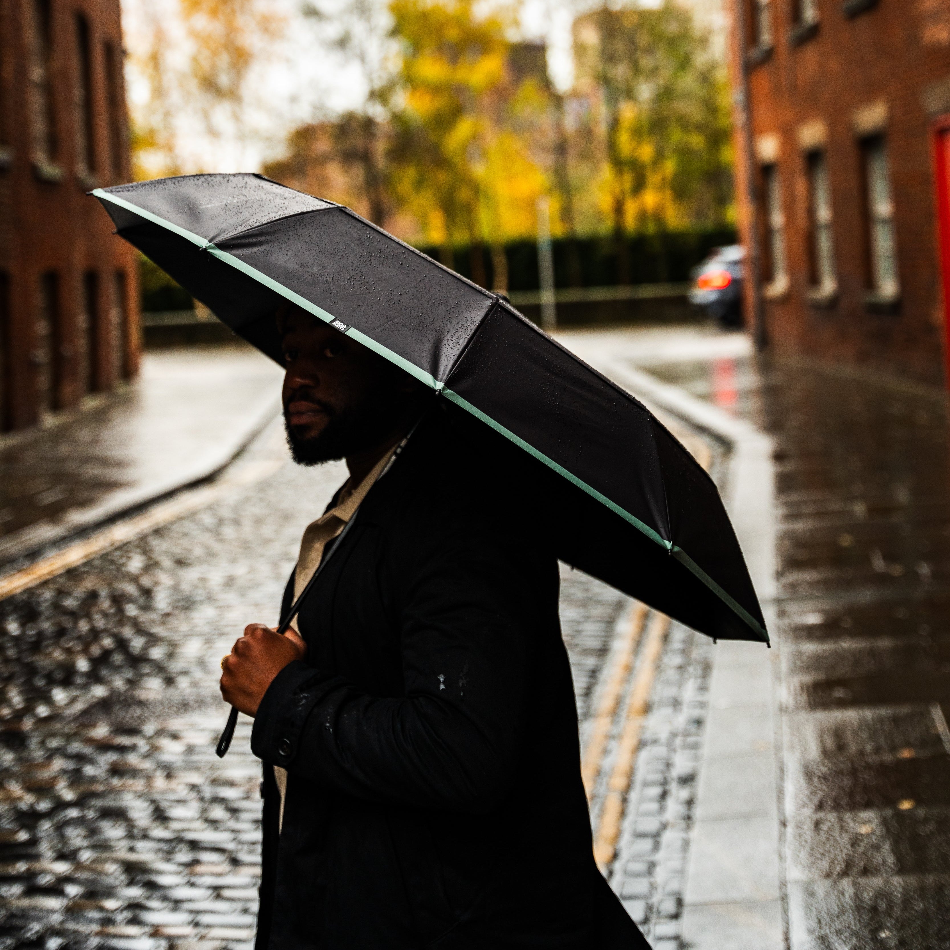 Reusable umbrella alternative designed to replace disposable rain accessories