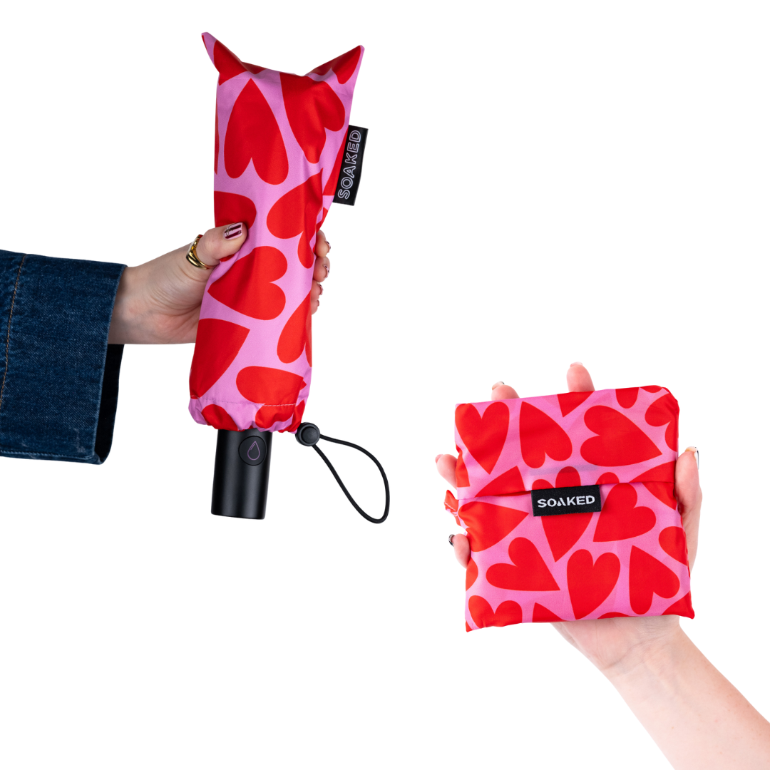 Close shot of Love Bug umbrella fabric and matching bag material with bold design