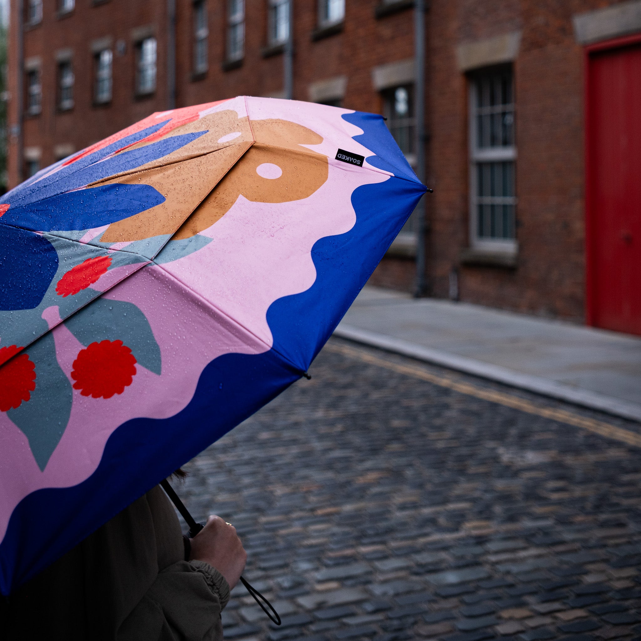 SOAKED sustainable umbrella representing umbrellas designed to last with resilient materials and thoughtful design