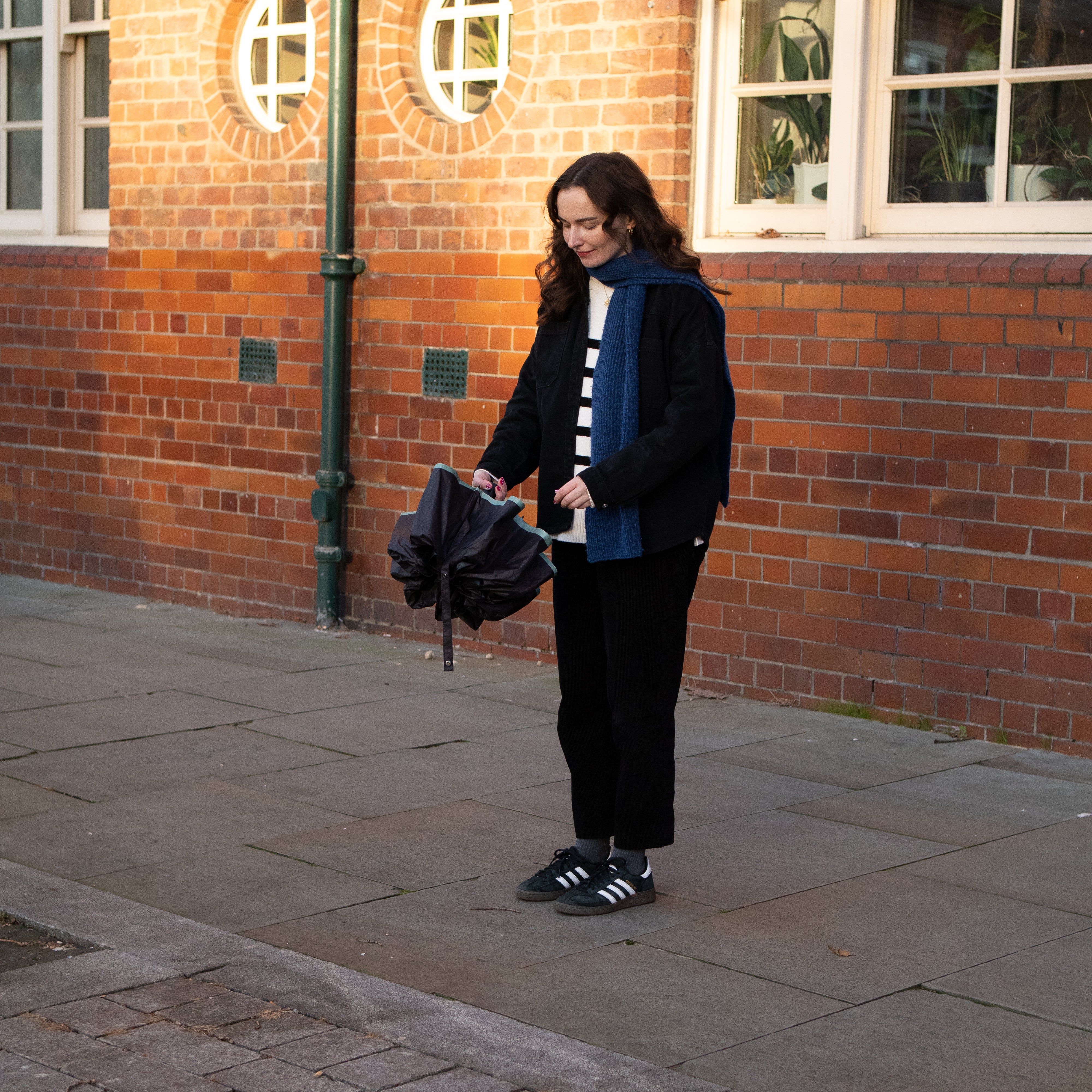 Preparing a SOAKED wind-resistant umbrella before use to maintain canopy shape and durability