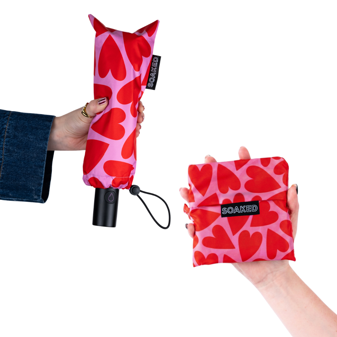Close shot of Love Bug umbrella fabric and matching bag material with bold design