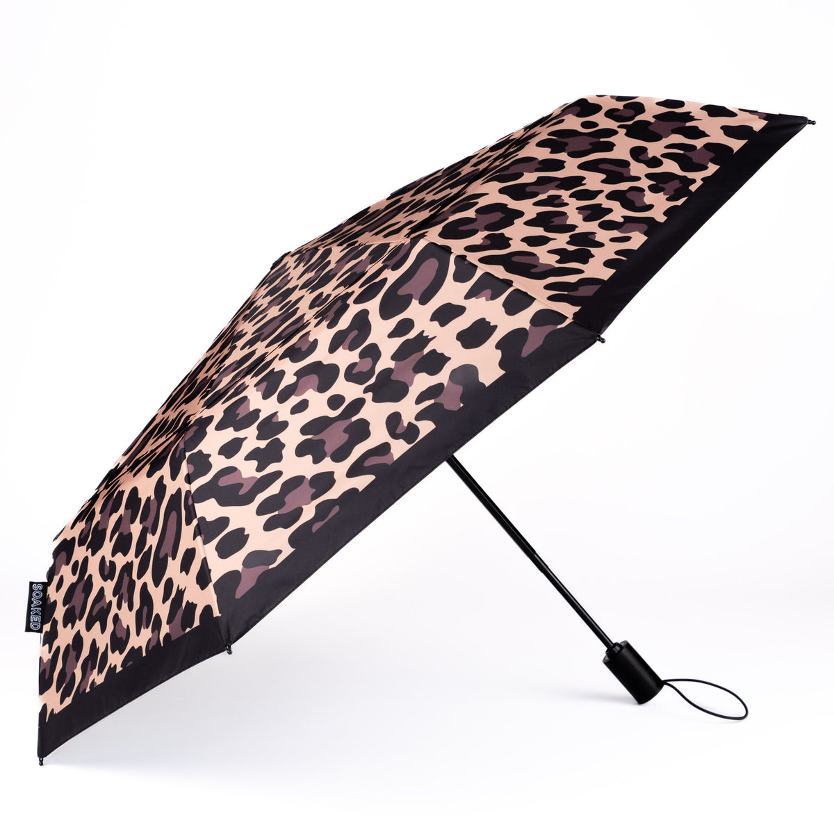 Side view of the vented, wind-resistant canopy on the SOAKED Wild Thing leopard print umbrella