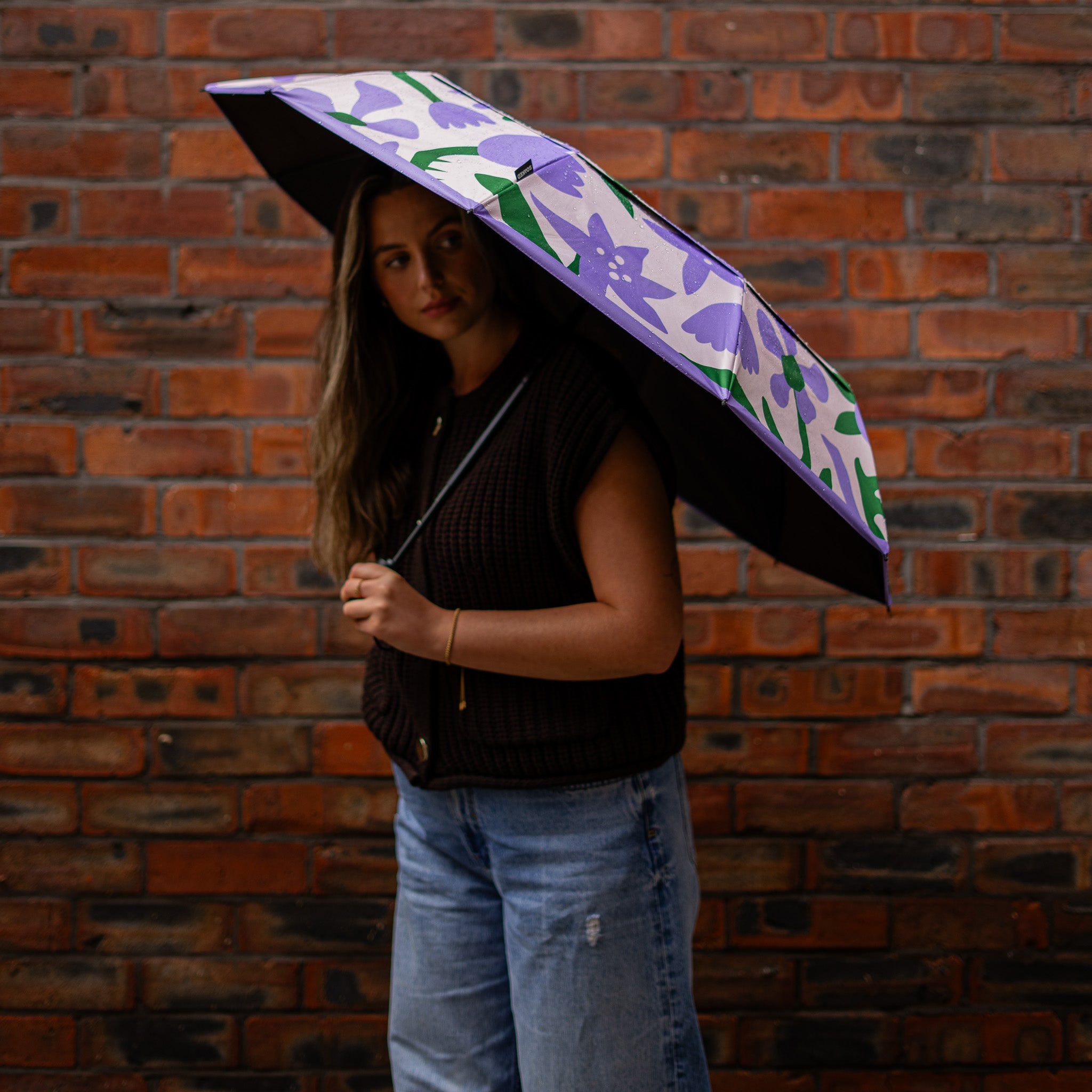 SOAKED take their umbrellas to the high street to educate shoppers