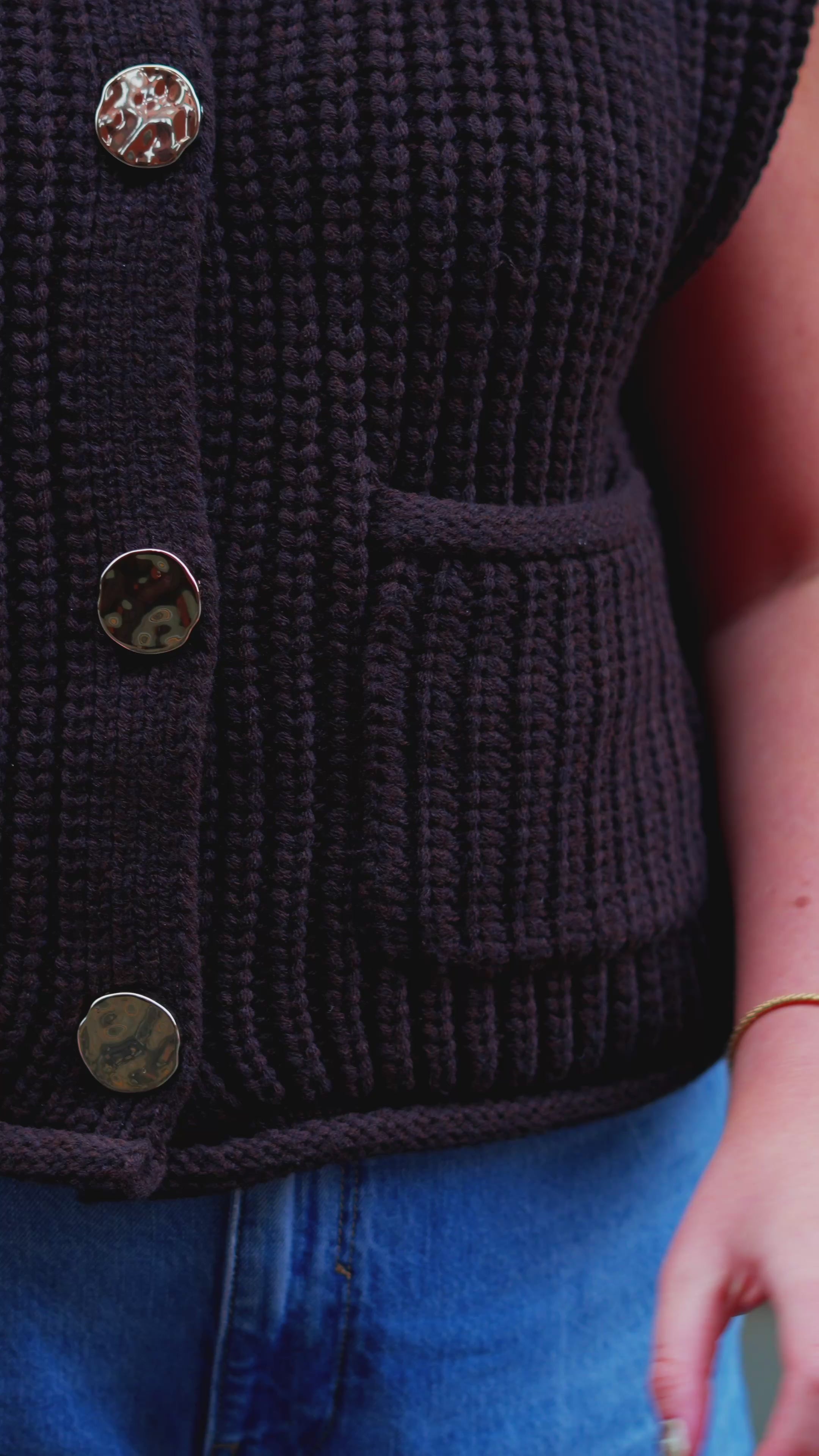 Sustainable SOAKED Wild Thing umbrella being used outdoors in rain