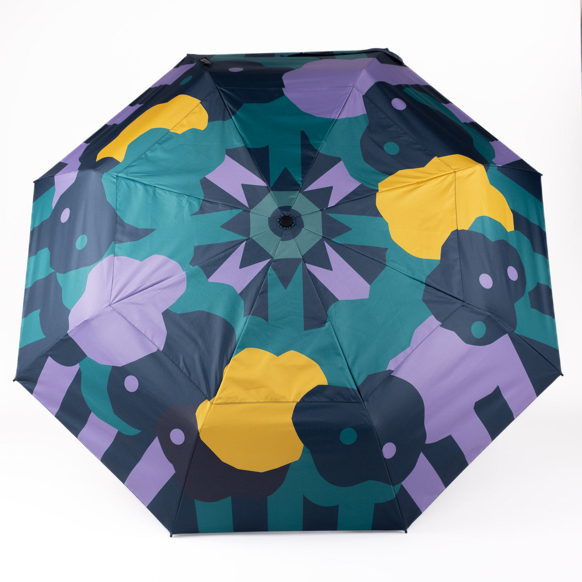 SOAKED Cloudburst cloud and floral umbrella open, showing the vented wind-resistant canopy