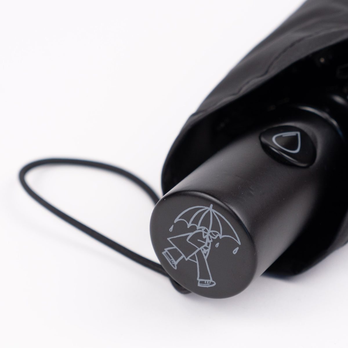 Close-up of the FSC-certified wooden handle and raindrop button on the SOAKED Dark Skies umbrella