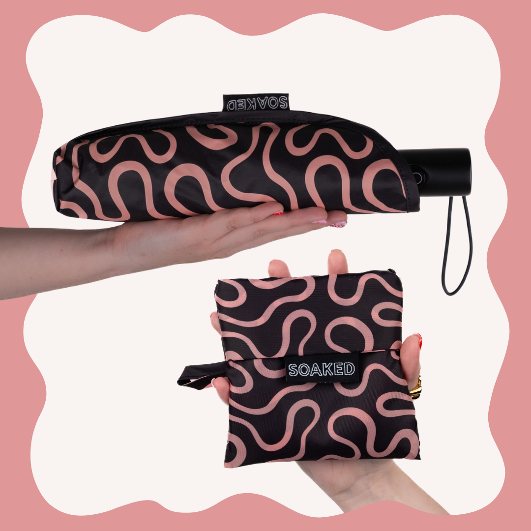 SOAKED Doodle black and peach swirl umbrella and matching recycled tote bag set, folded small