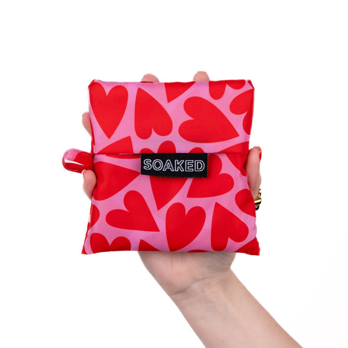 SOAKED Love Bug heart print tote bag folded small and compact, made from recycled plastic