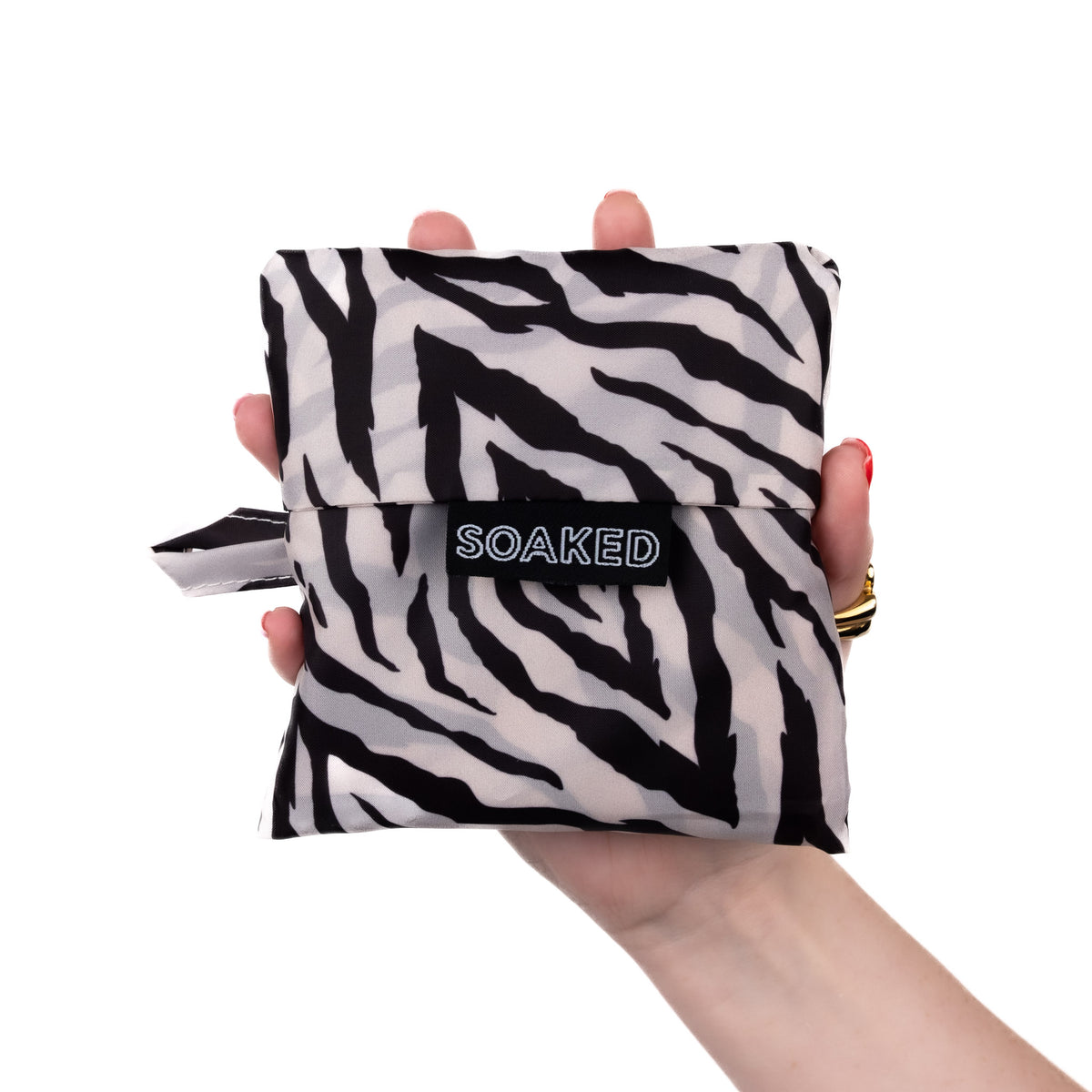 SOAKED Safari zebra print tote bag folded small and compact, made from recycled plastic