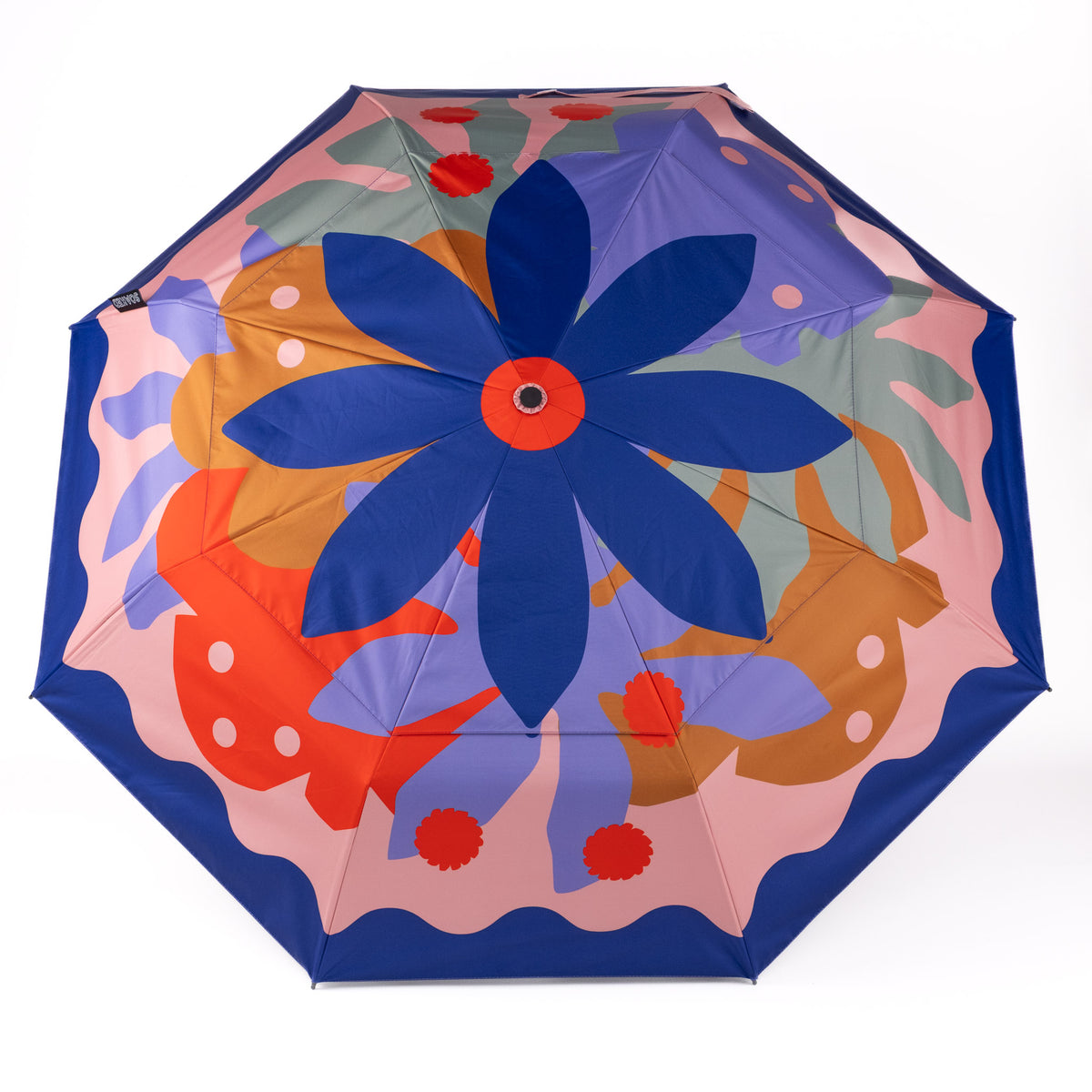SOAKED Superbloom bold floral umbrella open, showing the vented wind-resistant canopy
