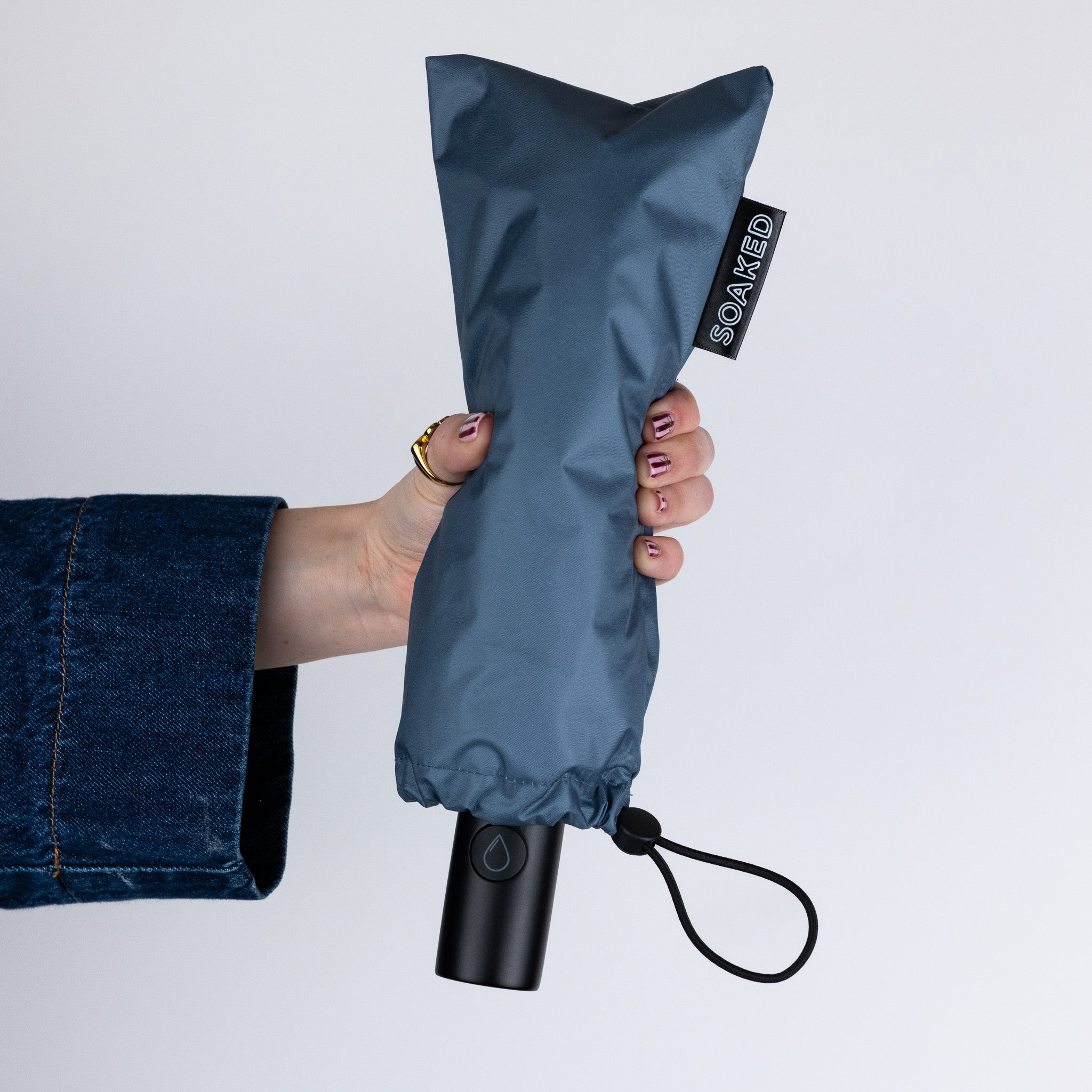 Close-up of SOAKED umbrella recycled fabric canopy with waterproof finish