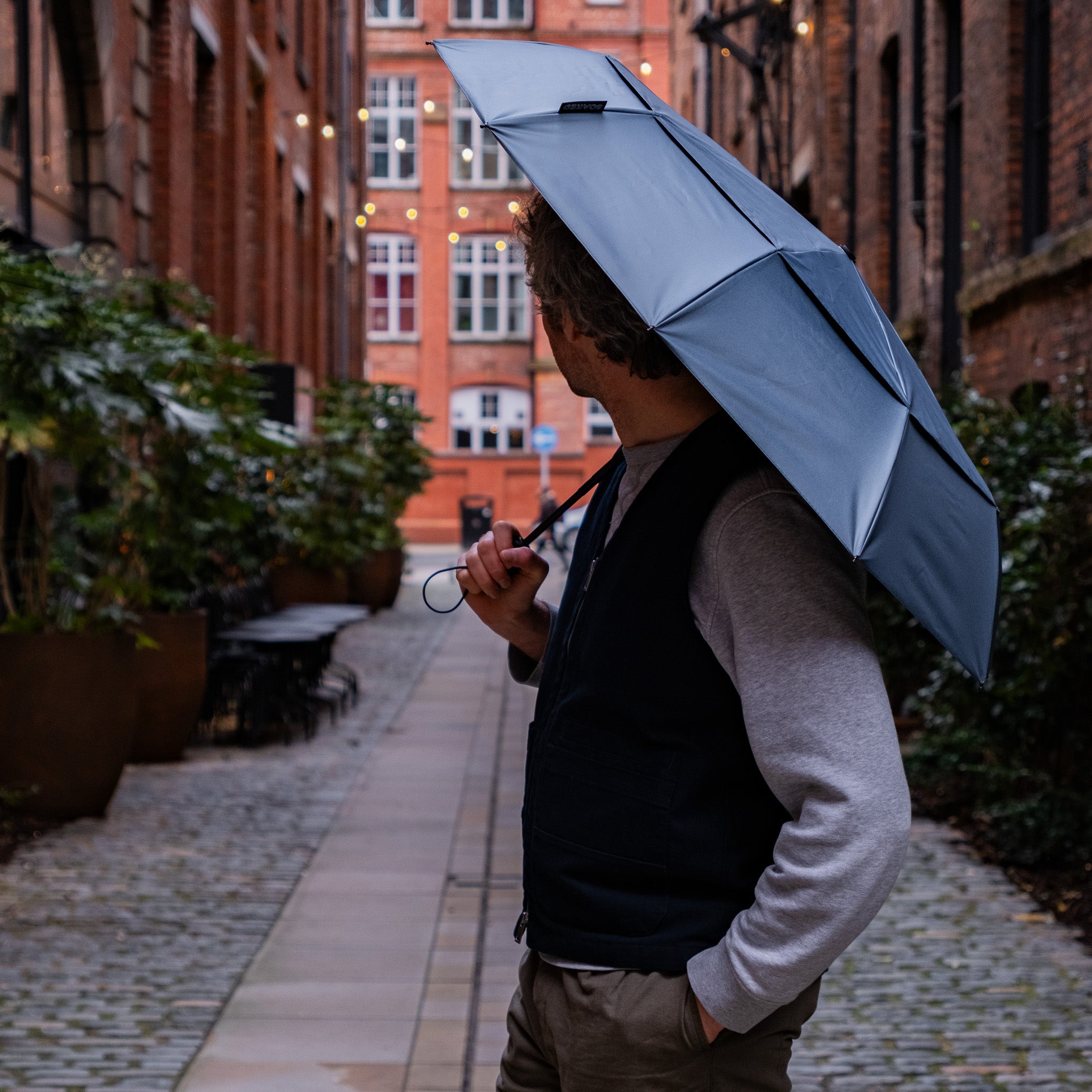 Open SOAKED umbrella showing bold pattern, vented canopy and durable construction