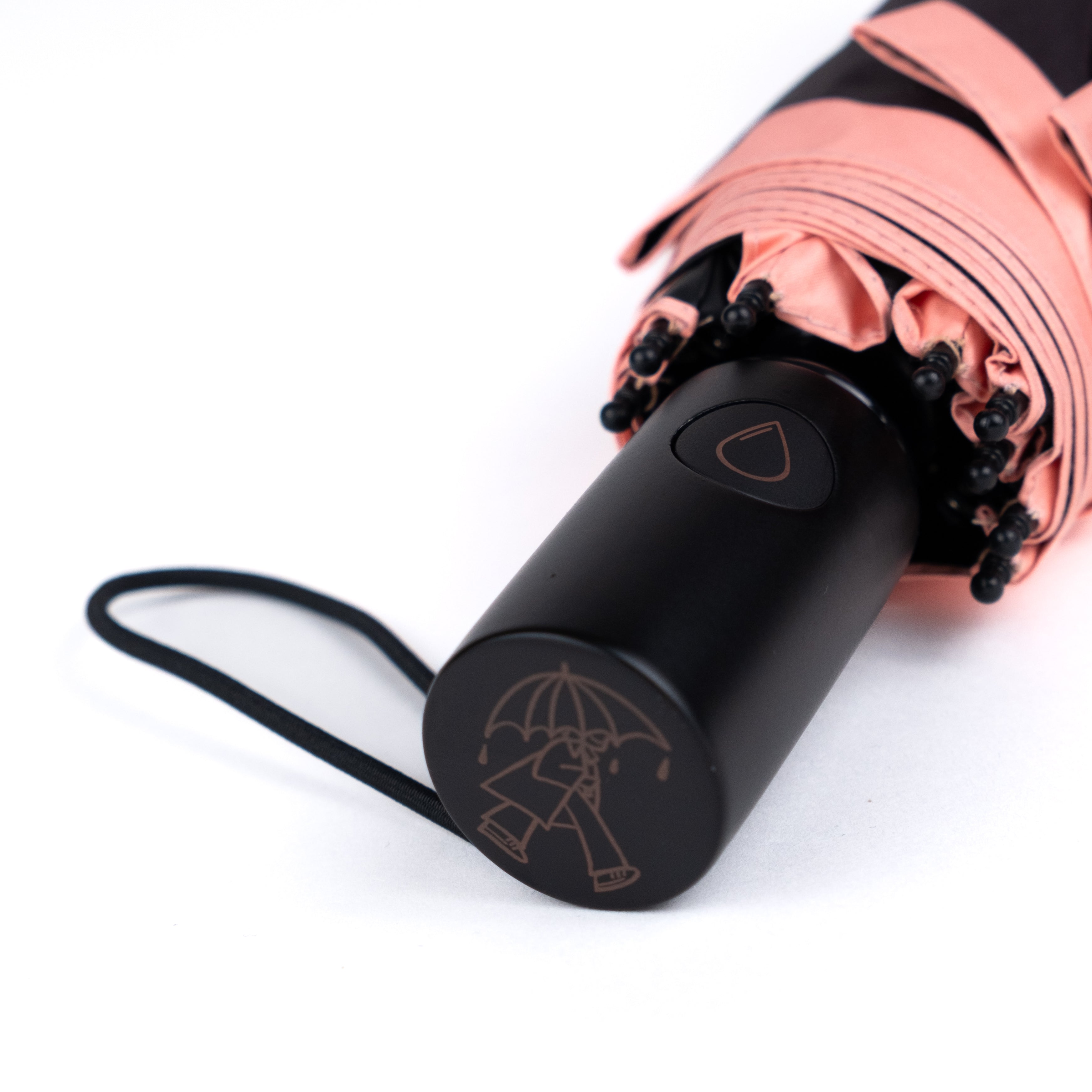 Close-up of wooden umbrella handle crafted for durability and feel