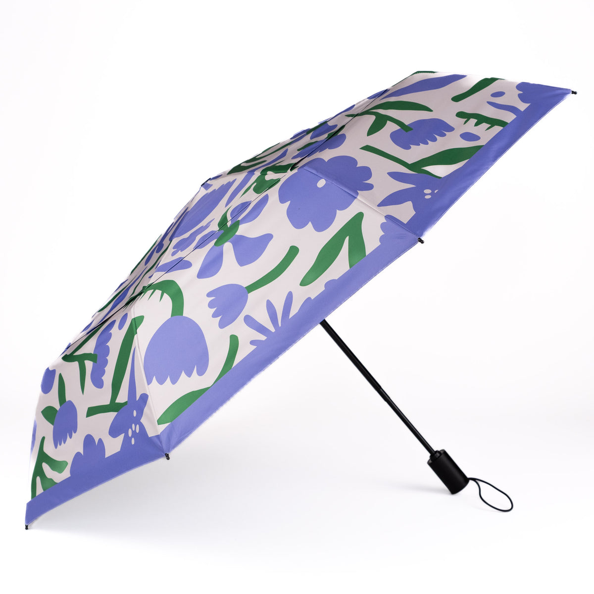 Side view of the vented, wind-resistant canopy on the SOAKED Wildflowers floral umbrella