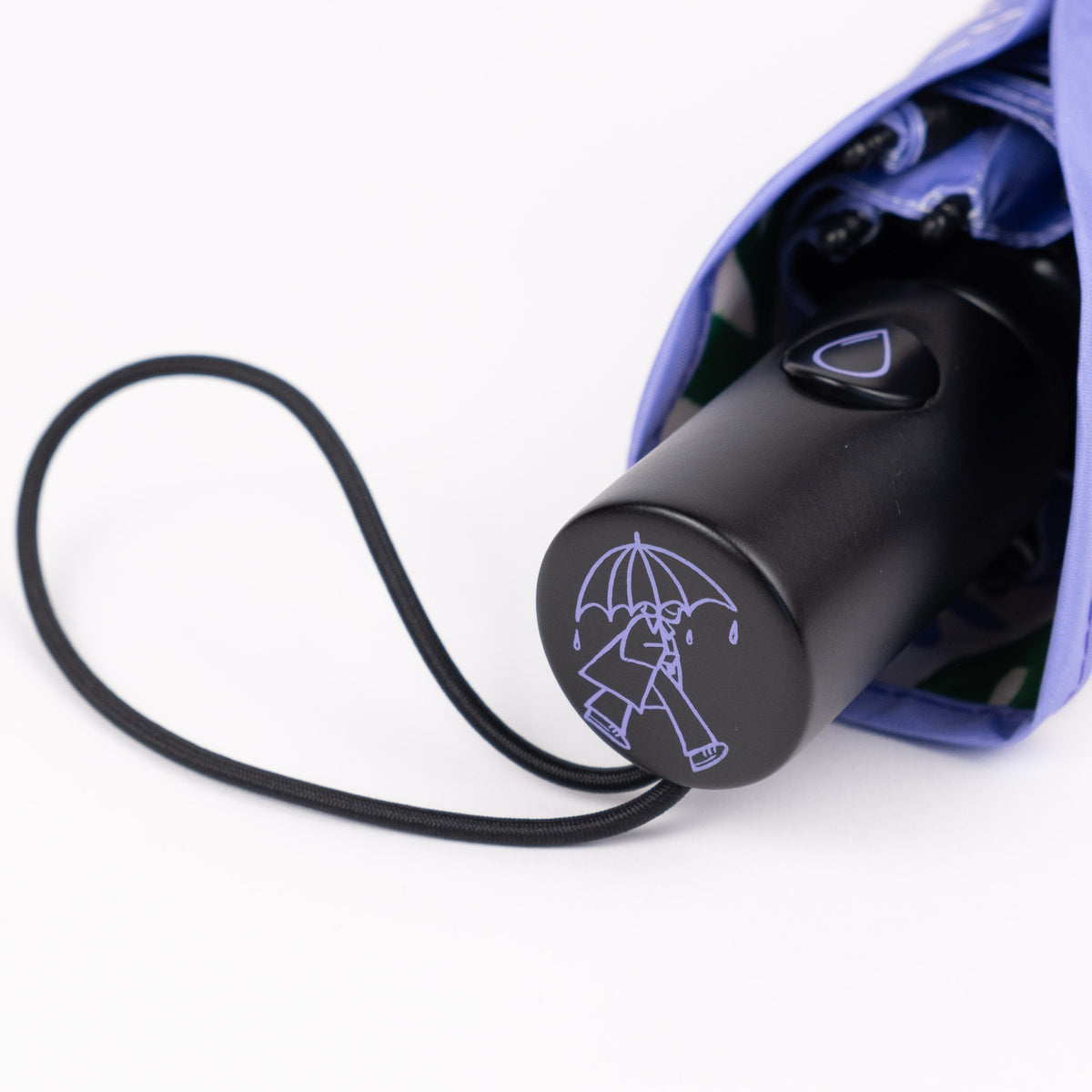 Close-up of the FSC-certified wooden handle and raindrop button on the SOAKED Wildflowers umbrella
